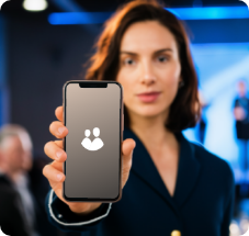 Professional showcasing expo mobile app technology to attendees